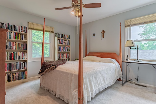 962 Thompson Blvd, Buffalo Grove, IL 60089 - carpeted bedroom with multiple windows and a ceiling fan