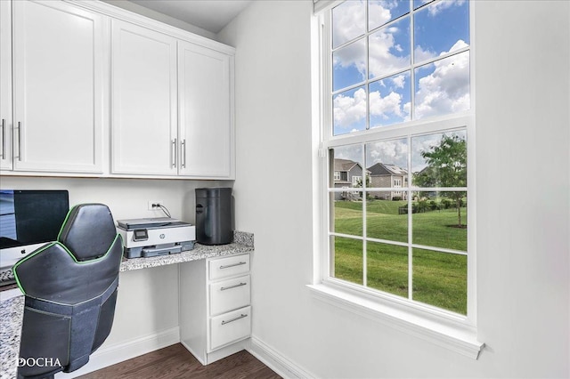 4327 Conifer Rd, Naperville, IL 60564 - home office featuring built in study area, healthy amount of natural light, and dark wood-style flooring