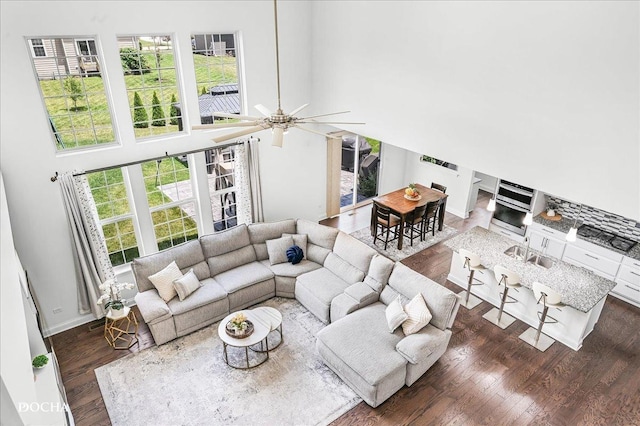4327 Conifer Rd, Naperville, IL 60564 - living room featuring wood finished floors, ceiling fan, and a high ceiling