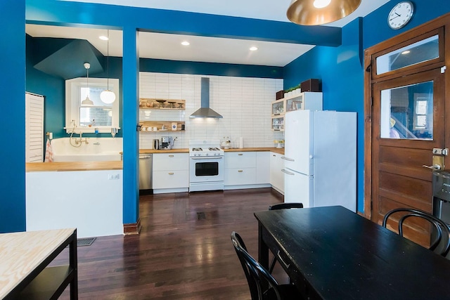 2340 W 19th St, Chicago, IL 60608 - kitchen with white appliances, wall chimney exhaust hood, white cabinetry, open shelves, and recessed lighting