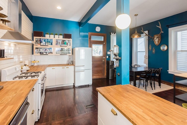 2340 W 19th St, Chicago, IL 60608 - kitchen with wood counters, white appliances, wall chimney range hood, open shelves, and white cabinetry