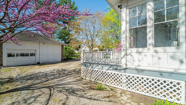 531 E Joliet St, Crown Point, IN 46307 - view of side of property with a detached garage and an outbuilding