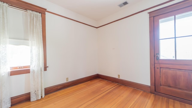 531 E Joliet St, Crown Point, IN 46307 - empty room with light wood-style floors and plenty of natural light