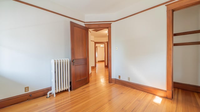 531 E Joliet St, Crown Point, IN 46307 - unfurnished room featuring radiator heating unit and light wood finished floors