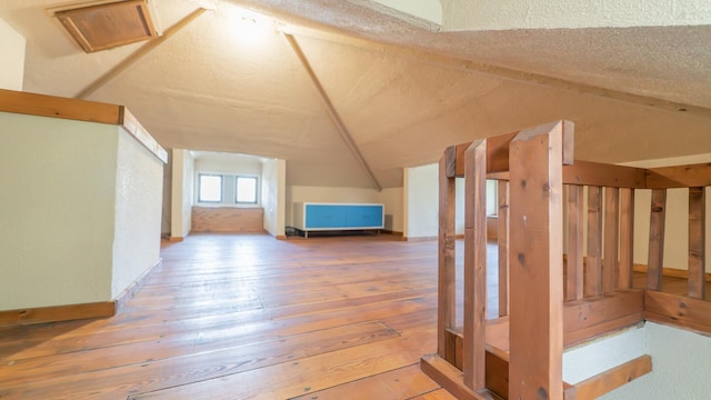 531 E Joliet St, Crown Point, IN 46307 - additional living space with wood-type flooring and a textured ceiling