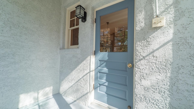 531 E Joliet St, Crown Point, IN 46307 - view of exterior entry featuring stucco siding