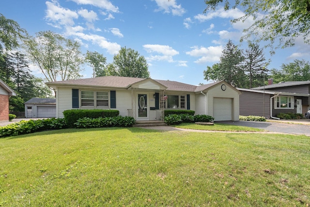 609 Oakwood Dr, Grayslake, IL 60030 - view of front of property featuring an attached garage, asphalt driveway, and a front lawn