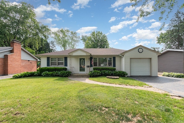 609 Oakwood Dr, Grayslake, IL 60030 - ranch-style home featuring an attached garage, driveway, and a front yard