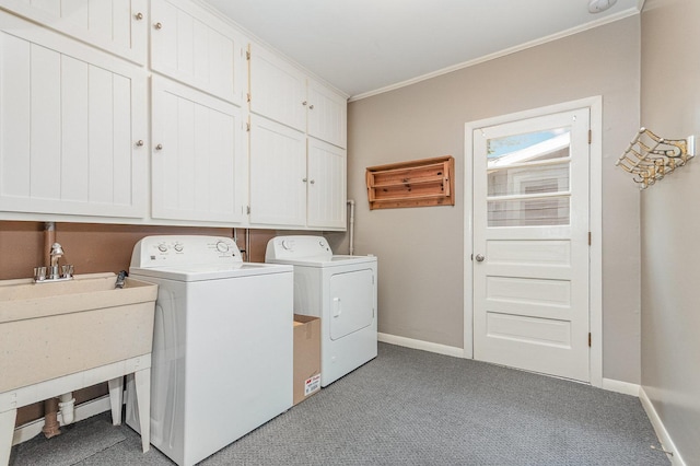 609 Oakwood Dr, Grayslake, IL 60030 - washroom featuring cabinet space, washing machine and clothes dryer, crown molding, and light colored carpet