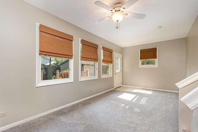 609 Oakwood Dr, Grayslake, IL 60030 - empty room featuring light colored carpet and a ceiling fan