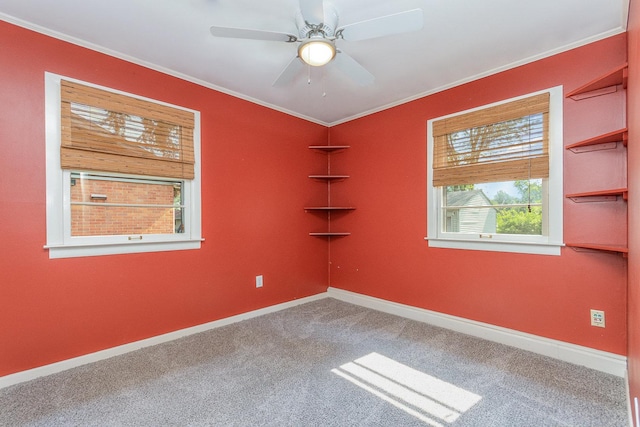 609 Oakwood Dr, Grayslake, IL 60030 - carpeted spare room featuring crown molding and a ceiling fan