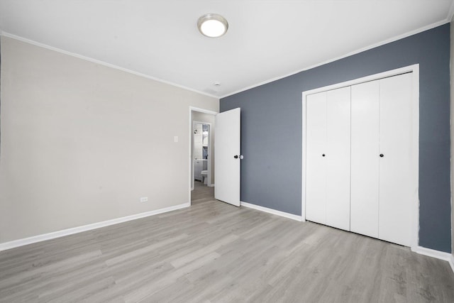 202 Allegheny St, Park Forest, IL 60466 - unfurnished bedroom featuring light wood-type flooring, ornamental molding, and a closet