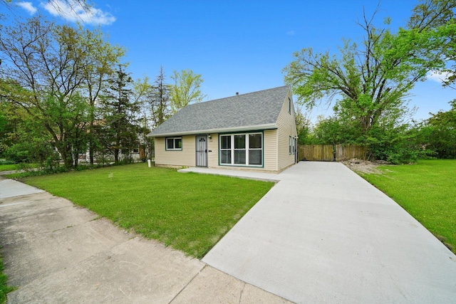 202 Allegheny St, Park Forest, IL 60466 - bungalow-style house featuring driveway and roof with shingles