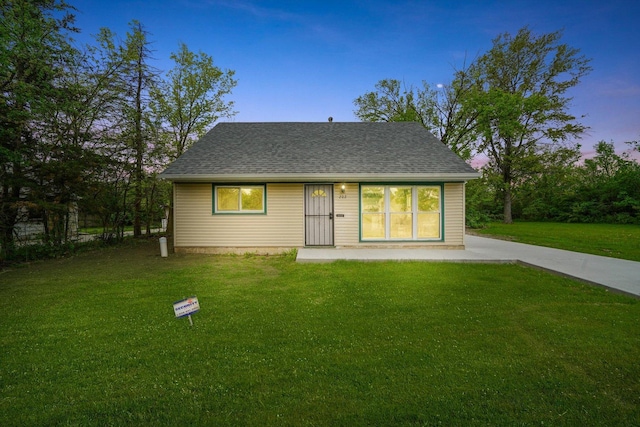 202 Allegheny St, Park Forest, IL 60466 - view of front of home featuring a lawn and roof with shingles