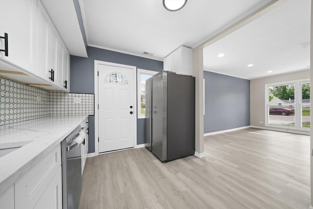 202 Allegheny St, Park Forest, IL 60466 - kitchen featuring stainless steel appliances, light wood-style floors, tasteful backsplash, white cabinets, and ornamental molding