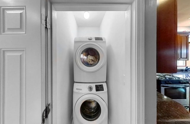 1031 N Mozart St Unit 2, Chicago, IL 60622 - washroom with stacked washing machine and dryer