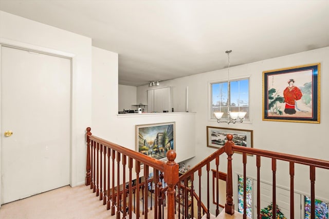 3 Lorraine Ave, Woodridge, IL 60517 - hall with an upstairs landing, carpet floors, and a chandelier