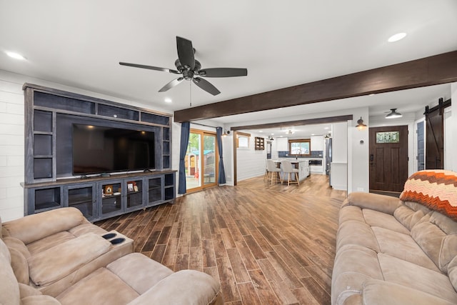 16430 S 89th Ave, Orland Park, IL 60462 - living area with a ceiling fan, a barn door, wood finished floors, recessed lighting, and beam ceiling