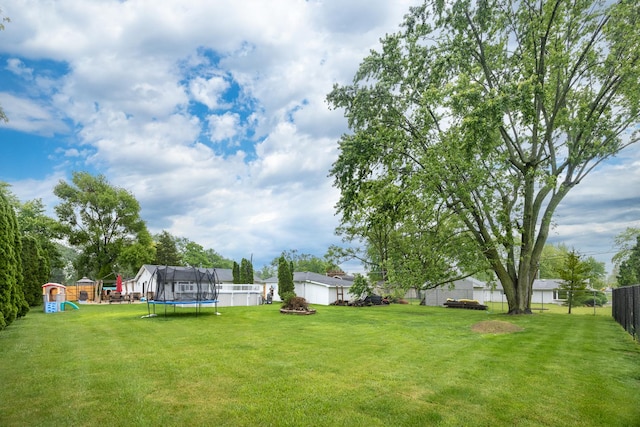 16430 S 89th Ave, Orland Park, IL 60462 - fenced backyard with a trampoline and a playground