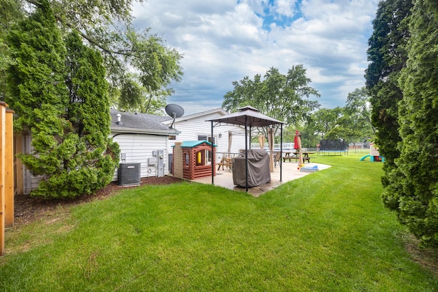 16430 S 89th Ave, Orland Park, IL 60462 - view of grassy yard featuring a trampoline, a gazebo, and a patio area