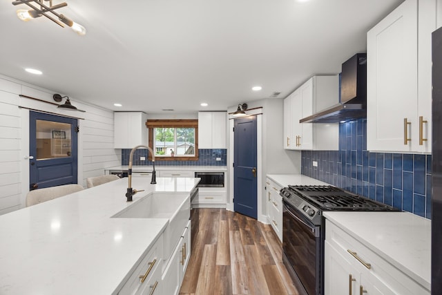 16430 S 89th Ave, Orland Park, IL 60462 - kitchen with black gas range oven, wall chimney range hood, dark wood-style flooring, light countertops, and tasteful backsplash