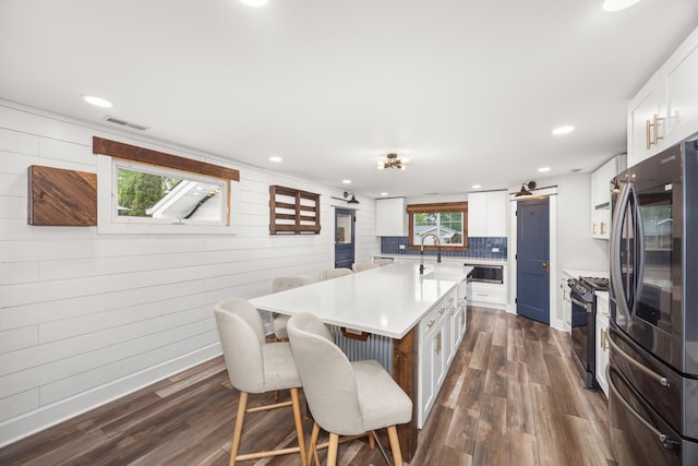 16430 S 89th Ave, Orland Park, IL 60462 - kitchen with stainless steel appliances, light countertops, dark wood finished floors, white cabinets, and recessed lighting