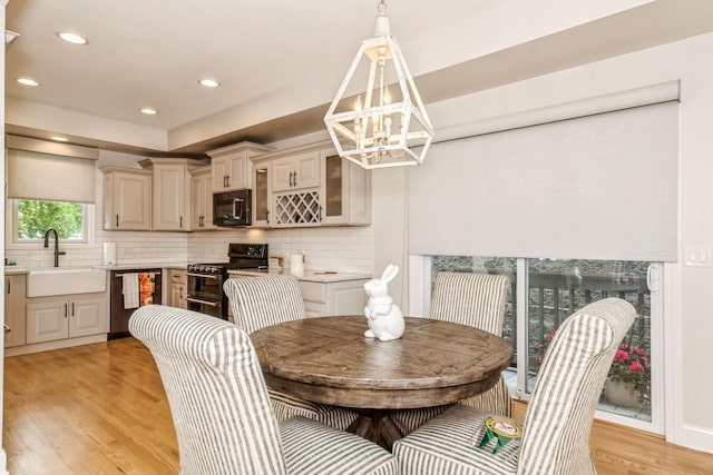 835 W 37th St Unit A, Chicago, IL 60609 - dining room featuring a chandelier, light wood finished floors, and recessed lighting