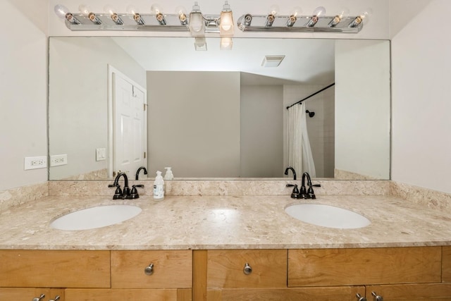 835 W 37th St Unit A, Chicago, IL 60609 - bathroom featuring double vanity and curtained shower