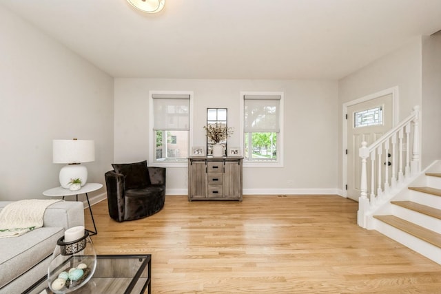 835 W 37th St Unit A, Chicago, IL 60609 - living room featuring healthy amount of natural light, light wood finished floors, and stairs