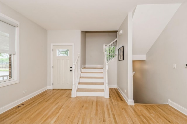 835 W 37th St Unit A, Chicago, IL 60609 - foyer entrance with light wood-style flooring and stairway