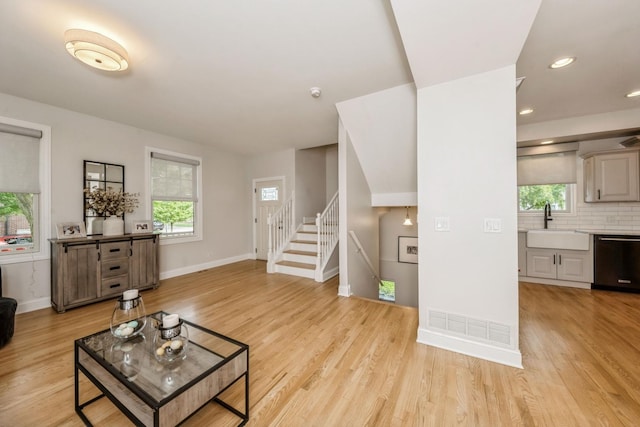 835 W 37th St Unit A, Chicago, IL 60609 - living area with plenty of natural light, light wood-style flooring, stairway, and recessed lighting
