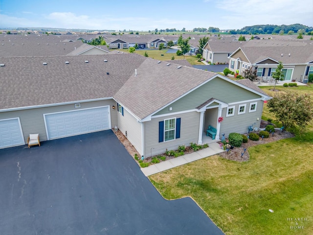 1106 Crestview Ln, Pingree Grove, IL 60140 - ranch-style home featuring a shingled roof, driveway, a residential view, an attached garage, and a front yard
