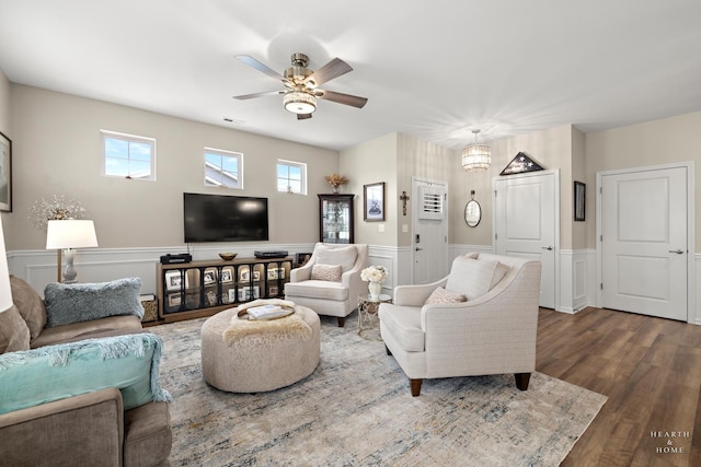 1106 Crestview Ln, Pingree Grove, IL 60140 - living area featuring ceiling fan, a wainscoted wall, and dark wood-style floors