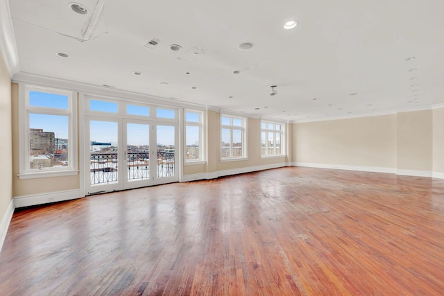 545 W Aldine Ave Unit 6E, Chicago, IL 60657 - empty room featuring ornamental molding, wood finished floors, and recessed lighting