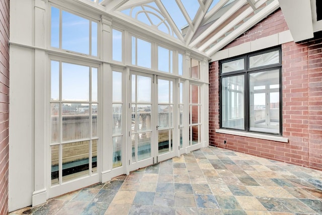 545 W Aldine Ave Unit 6E, Chicago, IL 60657 - unfurnished sunroom featuring vaulted ceiling and french doors