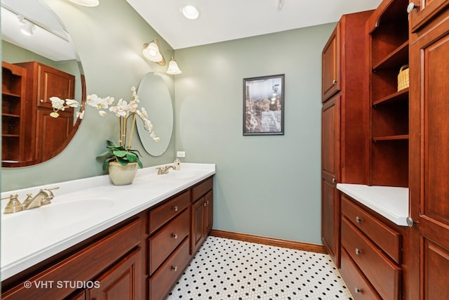 571 N Main St, Glen Ellyn, IL 60137 - bathroom featuring double vanity and tile patterned floors