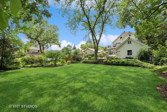 571 N Main St, Glen Ellyn, IL 60137 - view of yard featuring a balcony