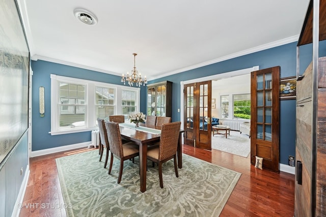 571 N Main St, Glen Ellyn, IL 60137 - dining room with french doors, a chandelier, dark wood-style floors, and crown molding