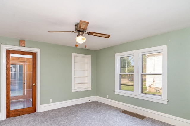 432 E Elm St, Sycamore, IL 60178 - unfurnished room featuring carpet flooring and a ceiling fan