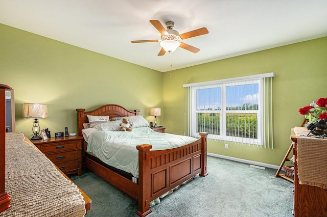 3872 Stadium St, Portage, IN 46368 - carpeted bedroom with baseboards and a ceiling fan