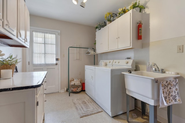 912 Eden Dr, Schaumburg, IL 60195 - laundry area featuring separate washer and dryer and cabinet space