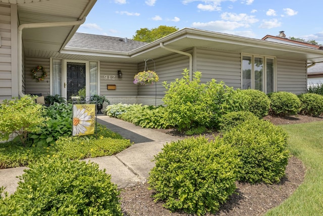 912 Eden Dr, Schaumburg, IL 60195 - property entrance featuring a shingled roof