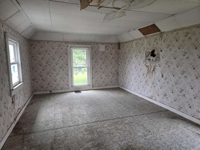 101 Vine St, Ludlow, IL 60949 - empty room featuring vaulted ceiling and wallpapered walls