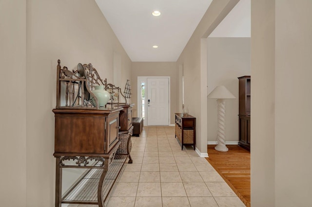 739 Pleasant Dr, Shorewood, IL 60404 - foyer entrance with light tile patterned floors and recessed lighting