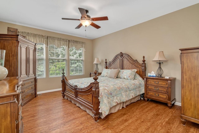 739 Pleasant Dr, Shorewood, IL 60404 - bedroom with light wood-style floors and ceiling fan