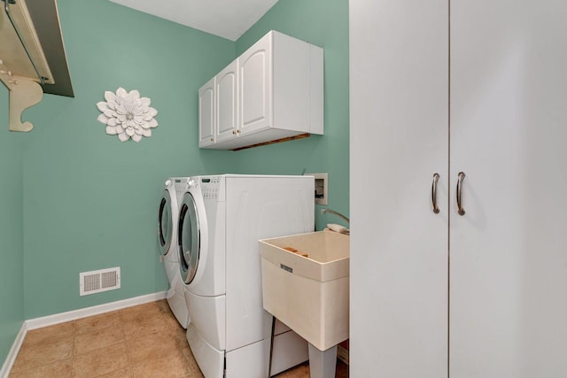 739 Pleasant Dr, Shorewood, IL 60404 - washroom with washer and clothes dryer and cabinet space