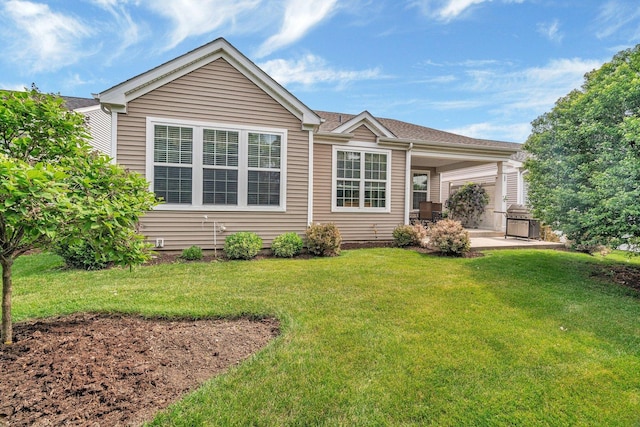 739 Pleasant Dr, Shorewood, IL 60404 - back of house with a patio area and a lawn