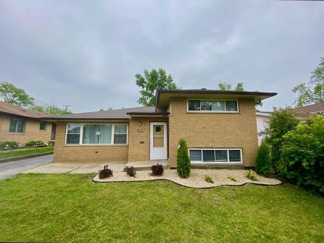 2803 172nd St, Hazel Crest, IL 60429 - split level home featuring brick siding and a front yard