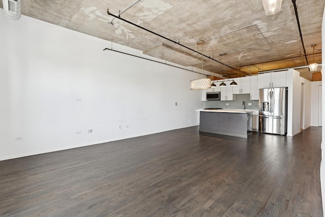6 S Laflin St Unit 607, Chicago, IL 60607 - kitchen with stainless steel appliances, dark wood-style flooring, open floor plan, light countertops, and white cabinets