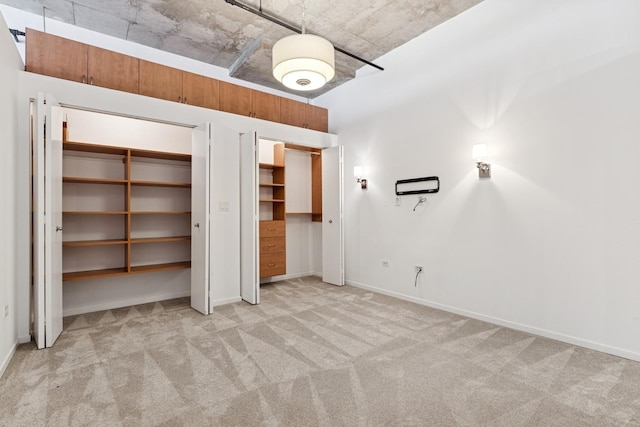 6 S Laflin St Unit 607, Chicago, IL 60607 - unfurnished bedroom with light carpet and two closets